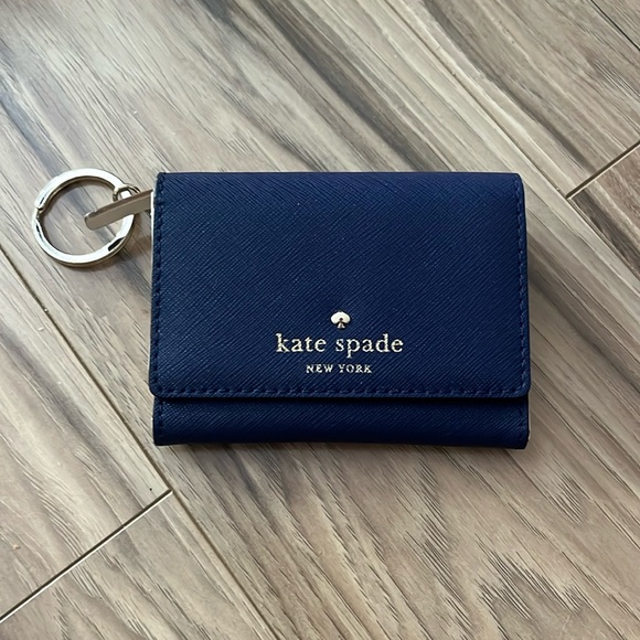 kate spade Handbags - Kate spade mini blue wallet